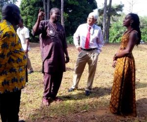 usaid mission director in liberia dr anthony chan and lgsa deputy chief of mission ms lauren dees erickson being briefed by mr jeremiah karmo director